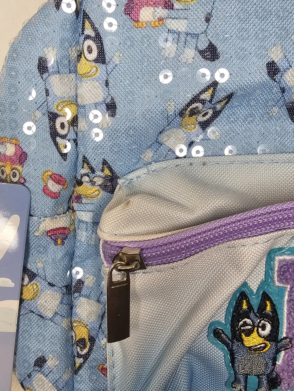 Blue Kids Backpack with Purple Trim and 'B' Patch